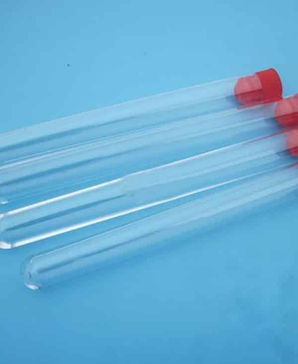TUBE A ESSAI PLASTIQUE AVEC CAPE ROUGE.
